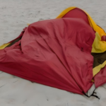 Tent Anchoring Collapsed Tent