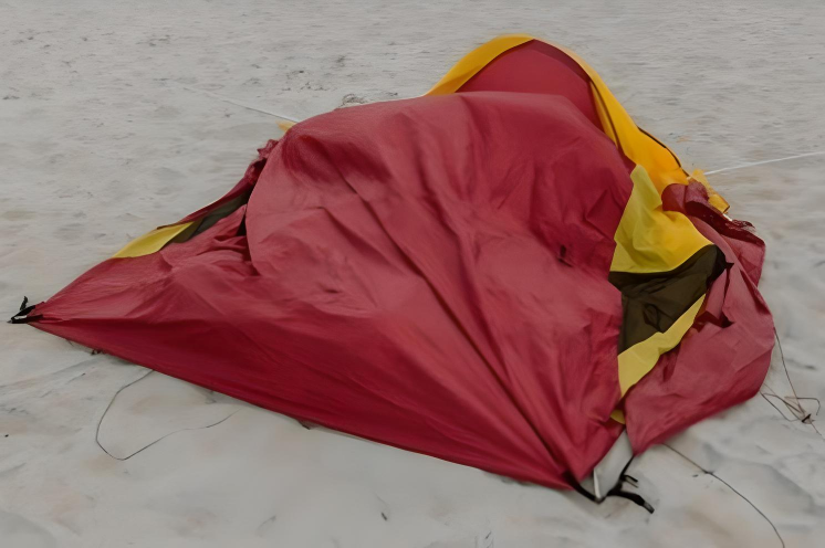 Tent Anchoring Collapsed Tent